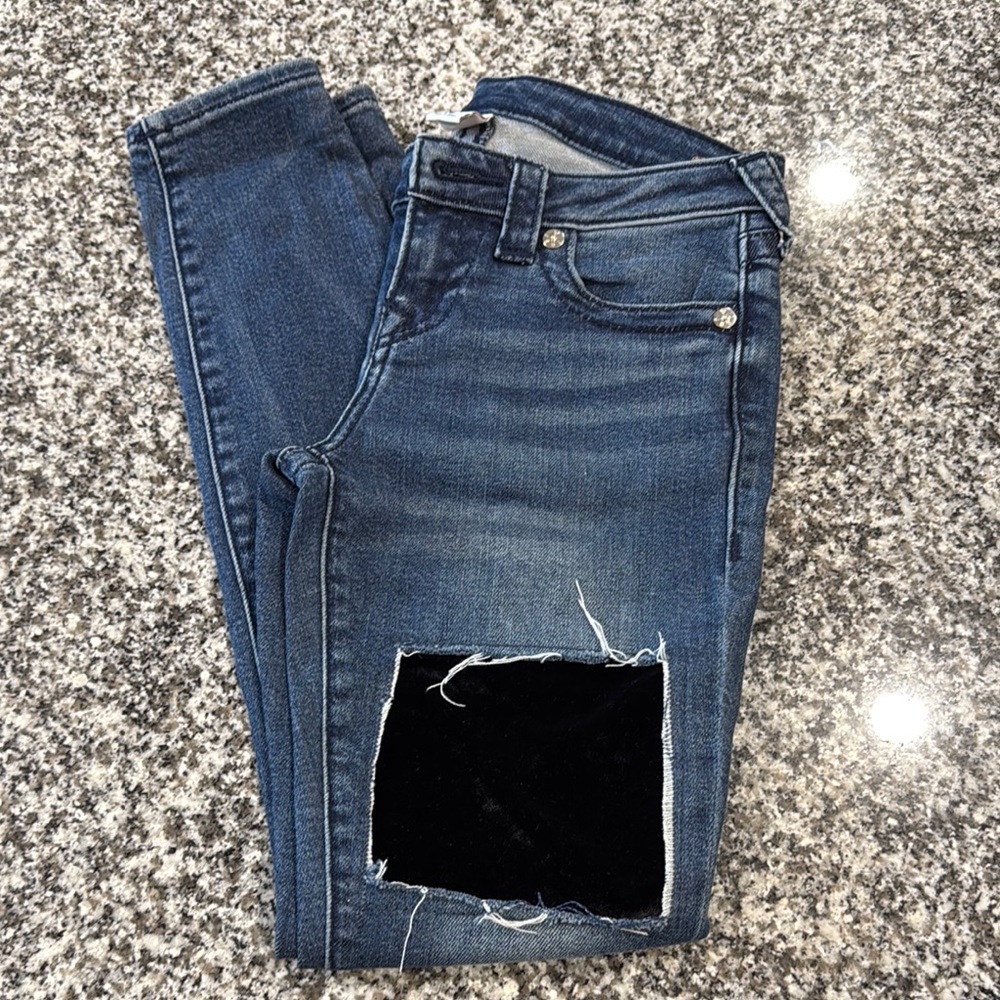 Stylish Blue Jeans with Black Patch